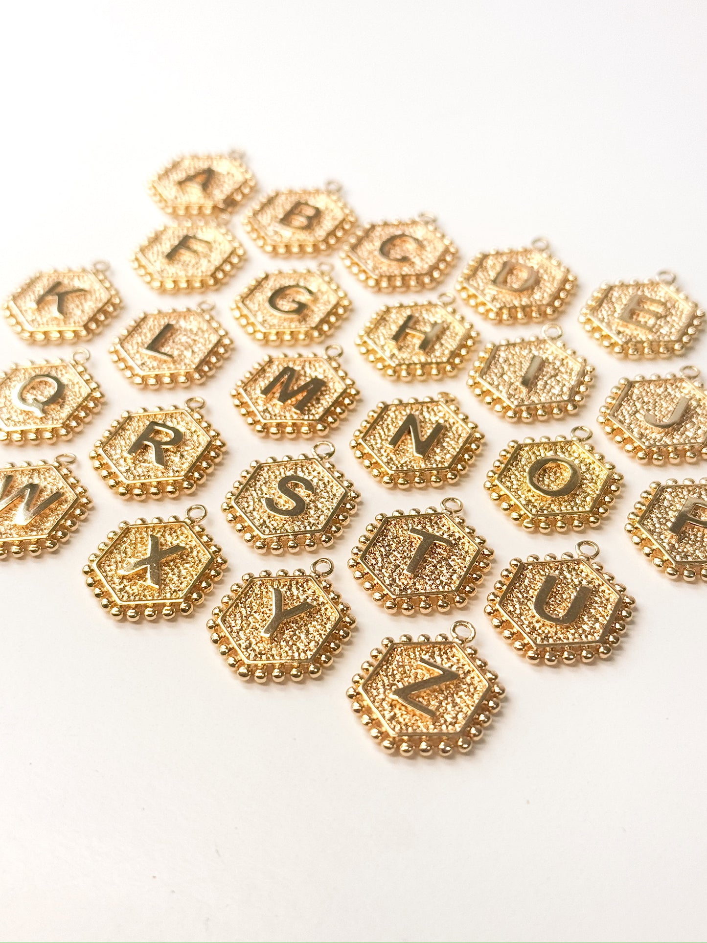 Hex Letter Gold Charm