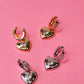 Club Serotonin Clear Jewel Heart Huggies