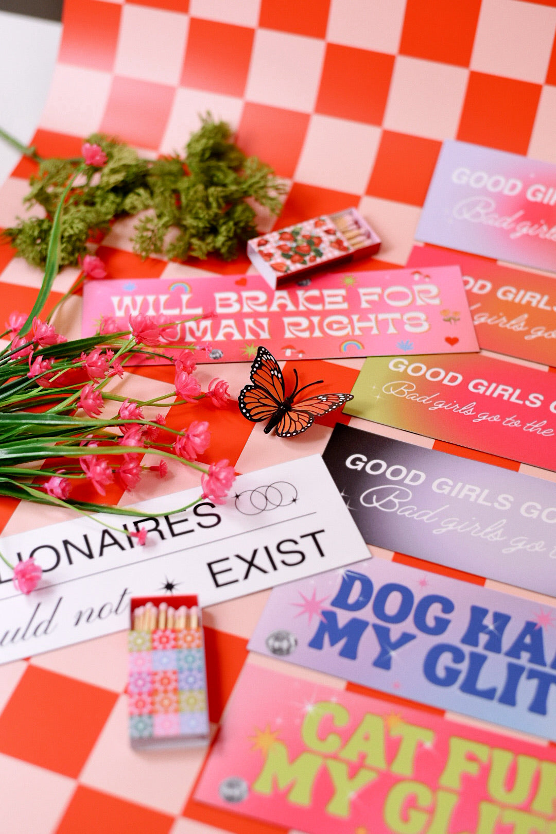 Colorful signs with various messages on a checkered background