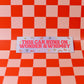 Card with 'This car runs on wonder & whimsy' text on a red and pink checkered background